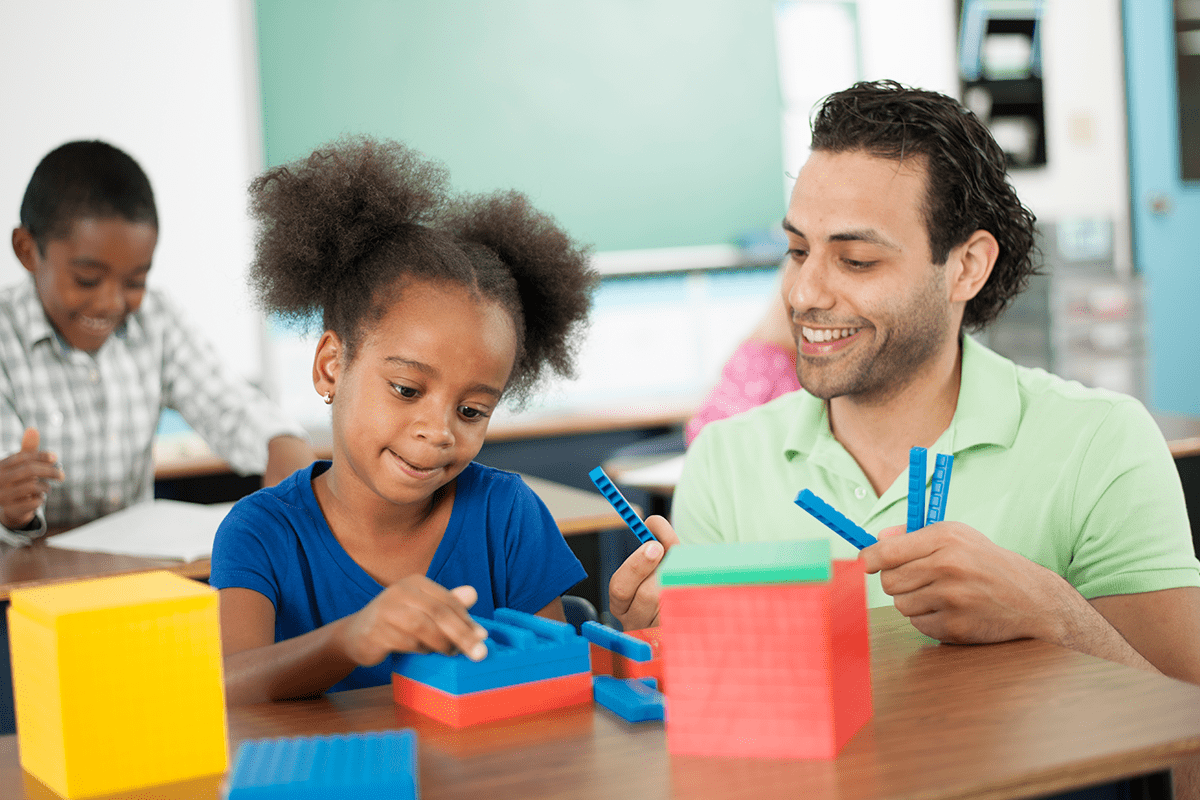 girl with math manipulatives