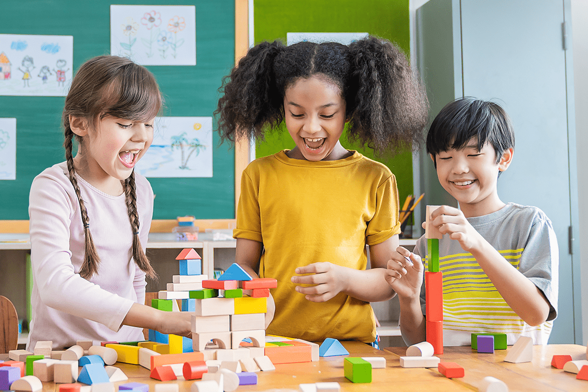 children playing with wooden blocks